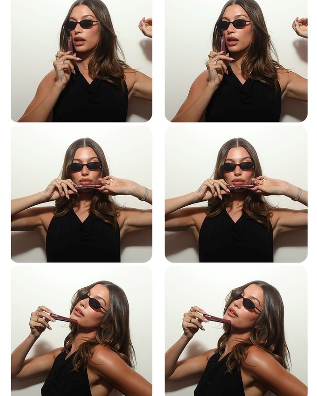 Kali ini Hailey memadukannya dengan kaca mata dan kitten heels serba hitam. Foto: Instagram