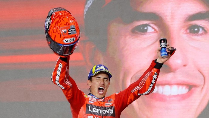 MotoGP - Qatar Grand Prix - Lusail International Circuit, Doha, Qatar - April 13, 2025 Ducati Lenovo Teams Marc Marquez celebrates on the podium after winning the Qatar Grand Prix REUTERS/Ibraheem Al Omari