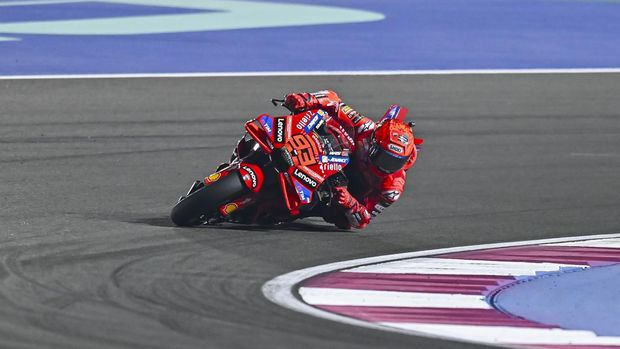 Spanish MotoGP rider Marc Marquez of the Ducati Lenovo Team competes in the sprint race during the Qatar Airways Motorcycle Grand Prix of Qatar at Lusail International Circuit in Lusail, Qatar, on April 12, 2025. (Photo by Noushad Thekkayil/NurPhoto via Getty Images)