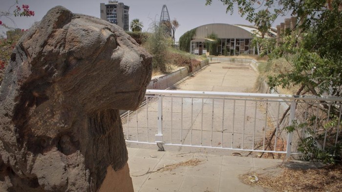 A Meroitic lion statue is seen in the garden of Sudan National Museum, the home to the country's largest artifacts that date to different eras of Sudanese history, after nearly two years of war between the army and paramilitary Rapid Support Forces (RSF), in Khartoum, Sudan, Thursday, April 3, 2025. (AP Photo/Khaled Abd Al Gader)