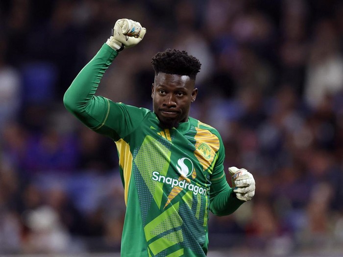 Soccer Football - Europa League - Quarter Final - First Leg - Olympique Lyonnais v Manchester United - Groupama Stadium, Lyon, France - April 10, 2025 Manchester Uniteds Andre Onana celebrates their second goal scored by Manchester Uniteds Joshua Zirkzee Action Images via Reuters/Andrew Couldridge