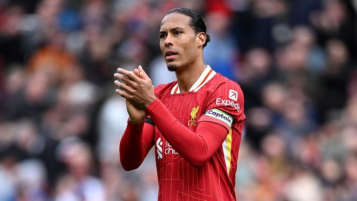 LIVERPOOL, ENGLAND - APRIL 13: Virgil van Dijk of Liverpool  celebrates victory after the Premier League match between Liverpool FC and West Ham United FC at Anfield on April 13, 2025 in Liverpool, England. (Photo by Justin Setterfield/Getty Images)