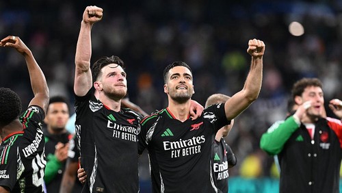 MADRID, SPAIN - APRIL 16: (L-R0 Arsenals Declan Rice and Mikel Merino celebrate after the UEFA Champions League 2024/25 Quarter Final Second Leg match between Real Madrid C.F. and Arsenal FC at Estadio Santiago Bernabeu on April 16, 2025 in Madrid, Spain. (Photo by Stuart MacFarlane/Arsenal FC via Getty Images)