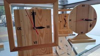 Bengkel ini, mereka memproduksi beragam hiasan meja berbahan kayu. Mulai dari jam, miniatur Vespa dan kapal, asbak, kotak dokumen, wadah pensil, hingga miniatur gubuk.