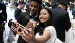 Potret Bahagia 5.000 Pasangan Ikut Nikah Massal di Korea Selatan