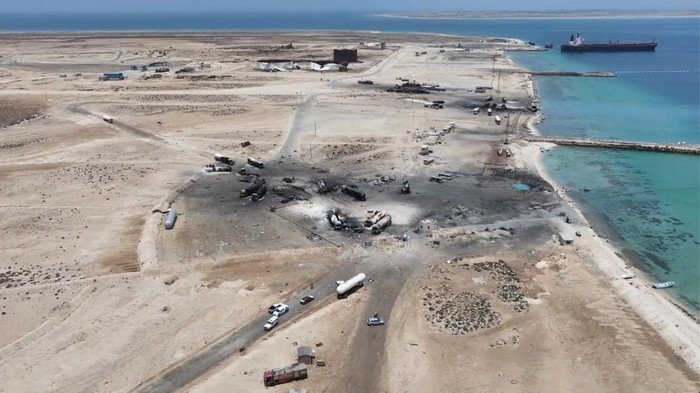 A drone view shows charred vehicles standing in the aftermath of what Al Masirah TV said was a U.S. strike on the Ras Isa fuel port, Al Jazirah, Yemen, in this screengrab from a handout video released on April 18, 2025. Al-Masirah TV/Handout via REUTERS THIS IMAGE HAS BEEN SUPPLIED BY A THIRD PARTY.