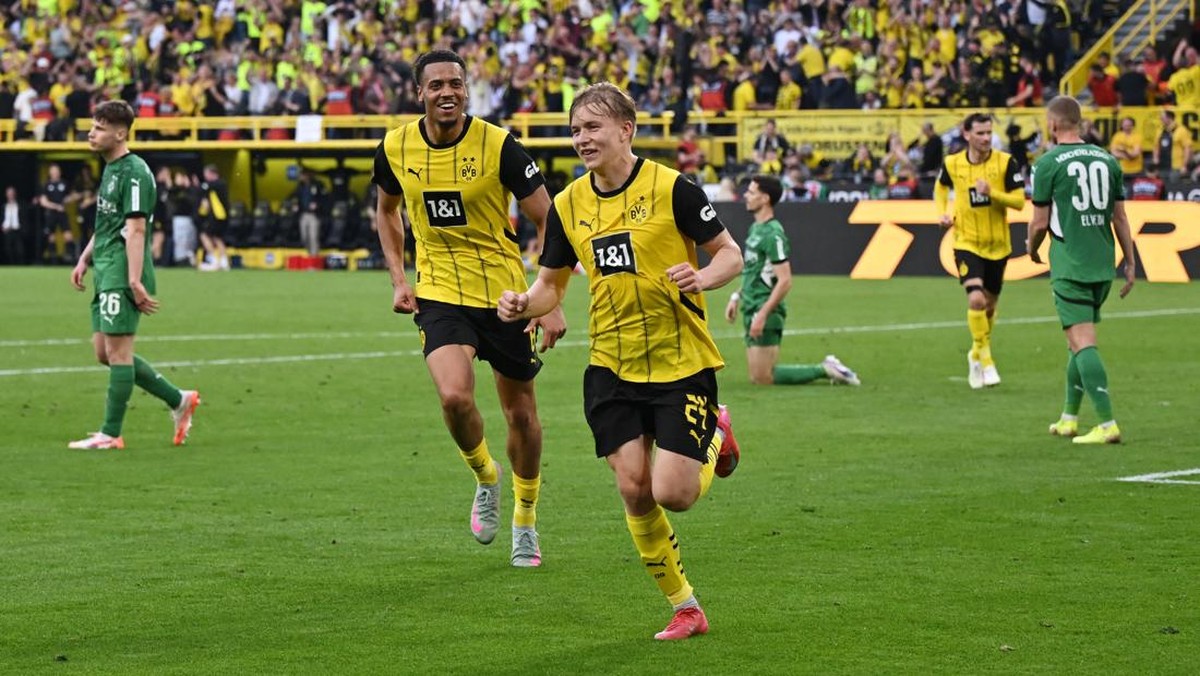 Borussia Dortmund menang 3-2 atas Borussia Moenchengladbach dalam lanjutan Bundesliga (Foto: REUTERS/Teresa. Kroeger)