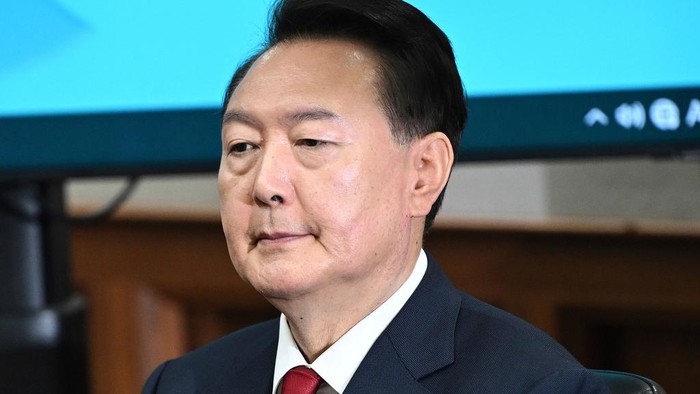 South Koreas ousted President Yoon Suk Yeol, who is facing charges of orchestrating a rebellion when he declared martial law on Dec. 3, attends his criminal trial at a courtroom of the Seoul Central District Court in Seoul Monday, April 21, 2025. (Jung Yeon-je/Pool Photo via AP)