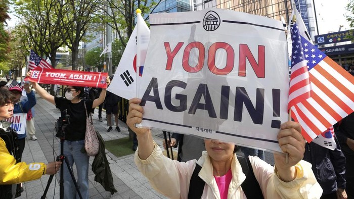South Korea's ousted President Yoon Suk Yeol, who is facing charges of orchestrating a rebellion when he declared martial law on Dec. 3, attends his criminal trial at a courtroom of the Seoul Central District Court in Seoul Monday, April 21, 2025. (Jung Yeon-je/Pool Photo via AP)
