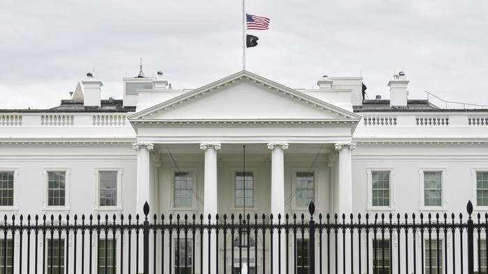 The U.S. flag is flown at half-staff at the White House in Washington in honor of Pope Francis, Monday, April 21, 2025. Pope Francis has died at age 88. (AP Photo/Jacquelyn Martin)