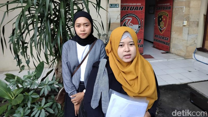 Kuasa hukum korban pelecehan dokter YA saat datang melapor ke Polresta Malang Kota.