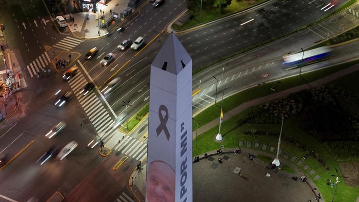 A drone view shows the projection of Pope Francis' portrait on the Obelisk, following the death of the pontiff, in Buenos Aires, Argentina, April 21, 2025. REUTERS/Martin Cossarini