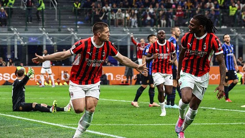 MILAN, ITALY - APRIL 23: Luka Jovic of AC Milan celebrates with Rafael Leao after scoring the his teams second goal during the Coppa Italia Semi Final match between FC Internazionale and AC Milan at Stadio Giuseppe Meazza on April 23, 2025 in Milan, Italy. (Photo by Giuseppe Cottini/AC Milan via Getty Images)