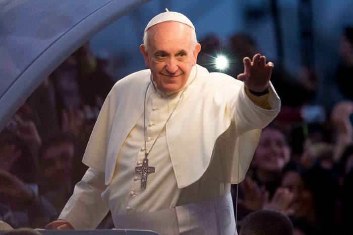 RIO DE JANEIRO, BRAZIL - JULY 26:  Pope Francis waves from the Popemobile on his way to attend the Via Crucis on Copacabana Beach during World Youth Day celebrations on July 26, 2013 in Rio de Janeiro, Brazil. More than 1.5 million pilgrims are expected to join the pontiff for his visit to the Catholic Churchs World Youth Day celebrations which is running July 23-28. (Photo by Buda Mendes/Getty Images)