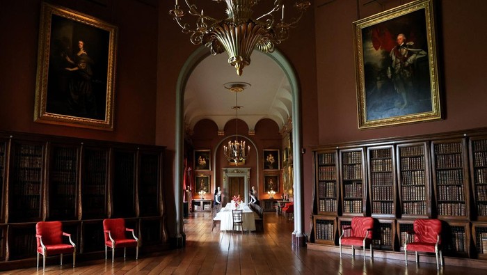 Catering staff set the table in the renovated Long Gallery at Castle Howard, renowned for its appearances in Brideshead Revisited and Bridgerton, during its unveiling following a major restoration, in York, Britain April 24, 2025. REUTERS/Temilade Adelaja