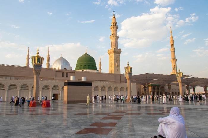 A majestic view of the green dome and the minarets of the Prophets Mosque, al-Masjid an-Nabawi, in the province of al-Madinah al-Munawwarah.