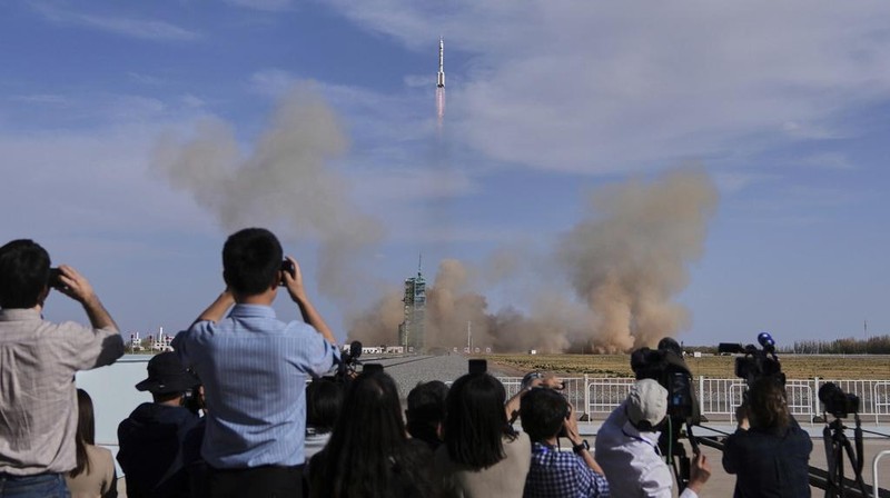 China's Long March 2F rocket, carrying three astronauts for the Shenzhou 20 manned space mission, lifts off for a space station, at the Jiuquan Satellite Launch Center in Jiuquan, northwestern China, Thursday, April 24, 2025. (AP Photo/Andy Wong)