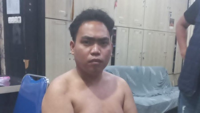 Tampang Gusmadi Wiranata (23) yang menembak ibu kandungnya di OKU Timur.