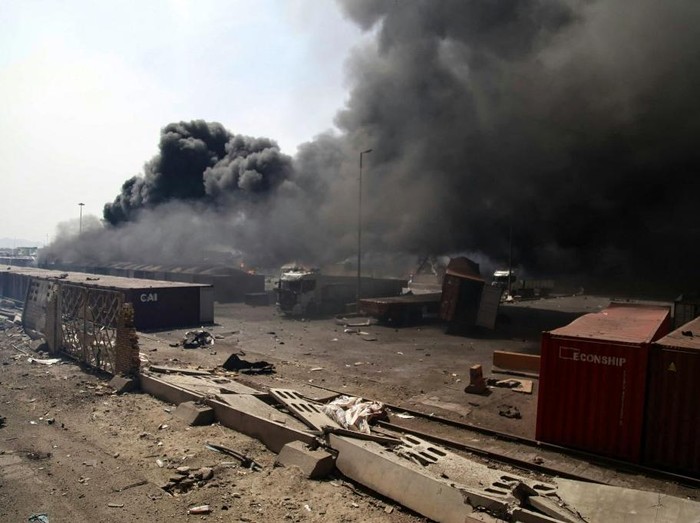 Thick, black smoke rises following an explosion at the Shahid Rajaee port dock southwest of Bandar Abbas in the Iranian province of Hormozgan on April 26, 2025. Several containers exploded on April 26 at Irans largest commercial port, authorities said, causing a major blast and fire, and leaving hundreds injured. Shahid Rajaee, more than 1,000 kilometres (620 miles) south of the capital, is the most advanced container port in Iran, according to the official IRNA news agency. (Photo by MOHAMMAD RASOLE  MORADI / IRNA / AFP)