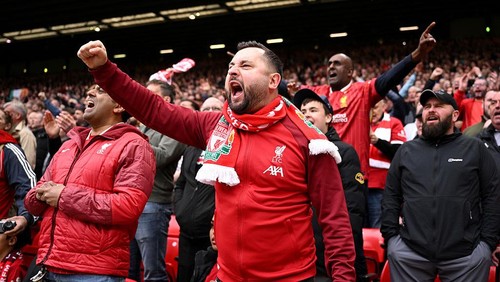 LIVERPOOL, ENGLAND - APRIL 13: Liverpool fans celebrate during the Premier League match between Liverpool FC and West Ham United FC at Anfield on April 13, 2025 in Liverpool, England. (Photo by Justin Setterfield/Getty Images)