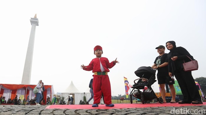 Semarak Warga Jakarta Ramaikan Lebaran Betawi di Monas Lebaran Betawi 2025 mengusung tema