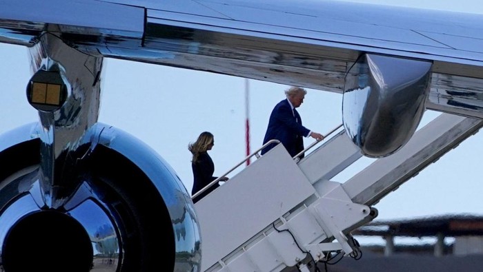 U.S President Donald Trump and first lady Melania Trump board Air Force One at Fiumicino Airport, Rome, on Saturday. Nathan Howard/Reuters