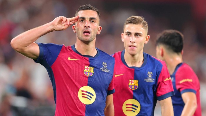 SEVILLE, SPAIN - APRIL 26: Ferran Torres of FC Barcelona celebrates scoring his teams second goal during the Copa del Rey Final match between FC Barcelona and Real Madrid at Estadio de La Cartuja on April 26, 2025 in Seville, Spain. (Photo by Fran Santiago/Getty Images)