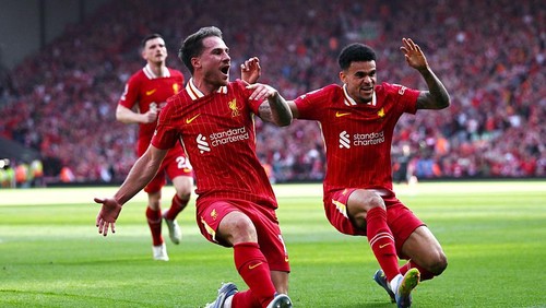 LIVERPOOL, ENGLAND - APRIL 27: (SUN OUT, SUN ON SUNDAY OUT) Alexis Mac Allister of Liverpool celebrates scoring his teams second goal during the Premier League match between Liverpool FC and Tottenham Hotspur FC at Anfield on April 27, 2025 in Liverpool, England. (Photo by Liverpool FC/Liverpool FC via Getty Images)