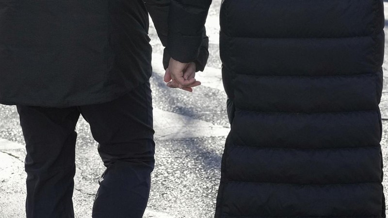 Tian Xin, a cyber matchmaker, hosts a livestream using the Chinese social media app Xiaohongshu (RedNote) from Hangzhou, China, early Friday, April 25, 2025. (AP Photo/Ng Han Guan)