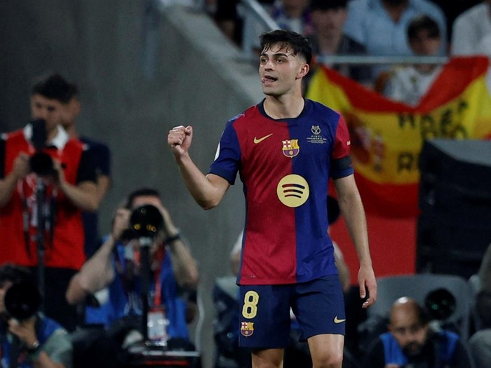 Soccer Football - Copa del Rey - Final - FC Barcelona v Real Madrid - Estadio de La Cartuja, Seville, Spain - April 26, 2025 FC Barcelona's Pedri celebrates scoring their first goal REUTERS/Marcelo Del Pozo