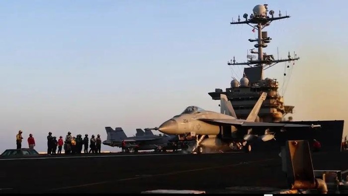 This image taken from video provided by the US Navy shows an aircraft launching from the USS Harry S. Truman in the Red Sea before airstrikes in Sanaa, Yemen, March 15, 2025. (AP)