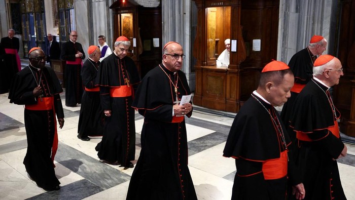 Cardinal Fernando Natalio Chomali Garib along with other Cardinals leaves after attending Vespers prayers at the Basilica of Saint Mary Major (Santa Maria Maggiore), in Rome, Italy, April 27, 2025. REUTERS/Guglielmo Mangiapane