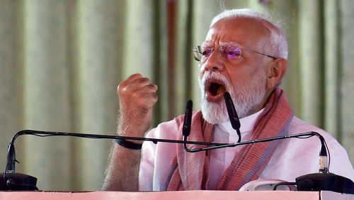 Indias Prime Minister Narendra Modi addresses a gathering in Madhubani district of Bihar state, on April 24, 2025. (Photo by Sachin KUMAR / AFP)