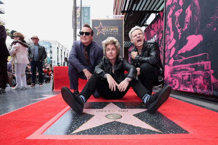 Billie Joe Armstrong, Mike Dirnt and Tre Cool from rock band Green Day pose on the day they unveil their star on the Hollywood Walk of Fame in Los Angeles, California, U.S., May 1, 2025. REUTERS/Mario Anzuoni TPX IMAGES OF THE DAY