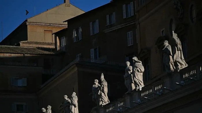 This photograph shows a view of the roof of the Sistine Chapel (Top) with statues of the colonnade in the foreground, following the funeral of the Pope and ahead of the conclave, in The Vatican, on May 2, 2025. (AFP)