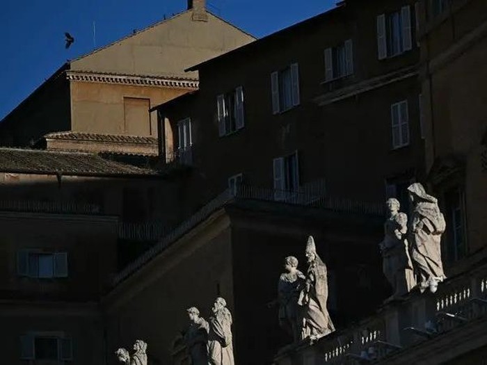 This photograph shows a view of the roof of the Sistine Chapel (Top) with statues of the colonnade in the foreground, following the funeral of the Pope and ahead of the conclave, in The Vatican, on May 2, 2025. (AFP)