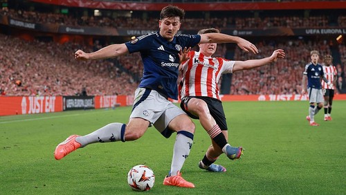 BILBAO, SPAIN - MAY 01: Harry Maguire of Manchester United is challenged by Daniel Vivian of Athletic Club  during the UEFA Europa League 2024/25 Semi Final First Leg match between Athletic Bilbao and Manchester United at San Mames Stadium on May 01, 2025 in Bilbao, Spain. (Photo by Clive Brunskill/Getty Images)