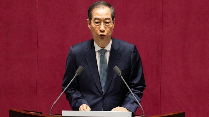 Acting president Han Duck-soo gives a speech on the government budget at the National Assembly in Seoul, South Korea, 24 April 2025. JEON HEON-KYUN/Pool via REUTERS