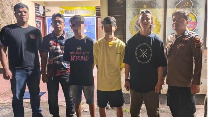 Polisi menangkap dua terduga pelaku yang menombak ojol di Manado.