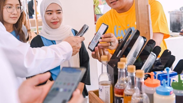 Ilustrasi transaksi digital Bank Mandiri