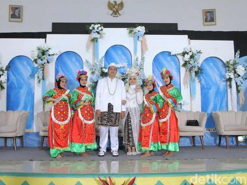 Foto pernikahan Bunga dan Ahmad.