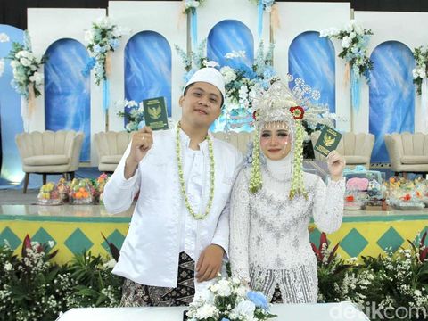Foto pernikahan Bunga dan Ahmad.