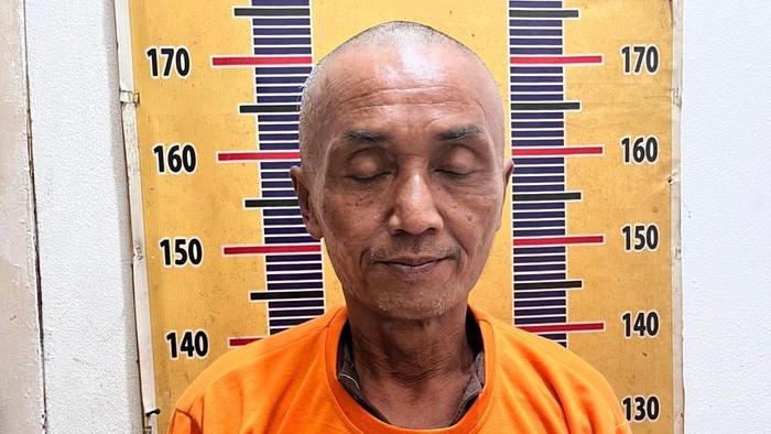 Tampang Suyono (53), sopir truk yang menyerahkan diri ke polisi.