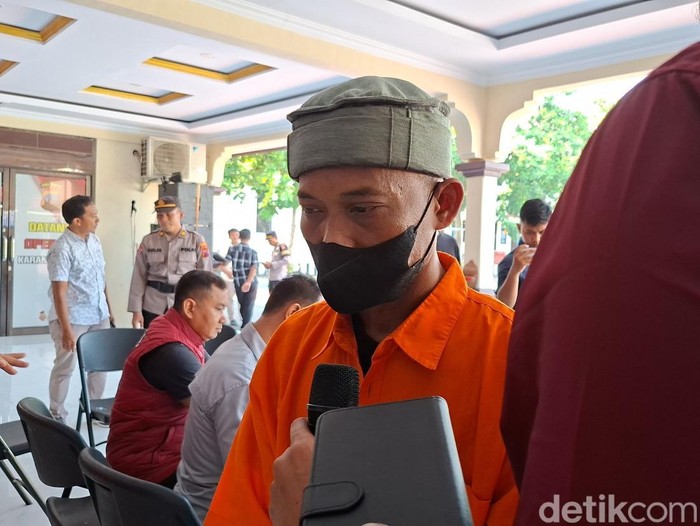 Tersangka korupsi hibah sapi, TM, saat konferensi pers di Mapolres Karanganyar, Selasa (6/5/2025).