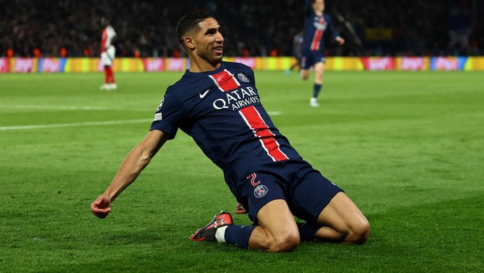 Soccer Football - Champions League - Semi Final - Second Leg - Paris St Germain v Arsenal - Parc des Princes, Paris, France - May 7, 2025 Paris St Germains Achraf Hakimi celebrates scoring their second goal REUTERS/Gonzalo Fuentes     TPX IMAGES OF THE DAY