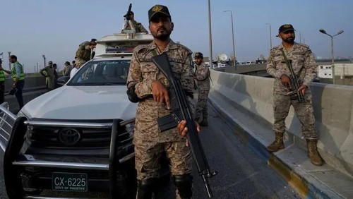 A paramilitary soldier stand alert on a road near Karachi port following raising military tension between Pakistan and India, in Karachi, Pakistan, Friday, May 9, 2025. (AP)