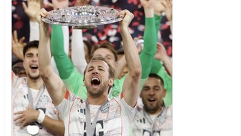 Harry Kane mengangkat trofi sebelum peluncuran GTA VI. Foto: X.com