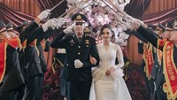 Iptu Mochammad Andhika memakai seragam dinas kepolisian berwarna hitam. Di sisi lain, Valerie Tifanka begitu anggun dan cantik dengan gaun putih. (Foto: dok Instagram)