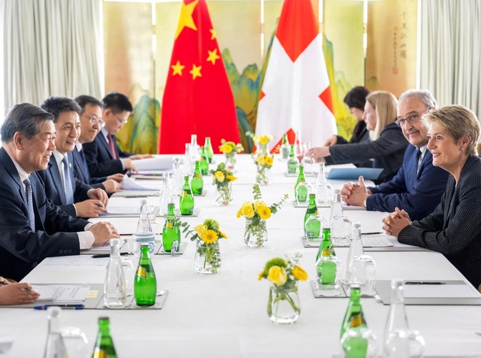FILE PHOTO: Chinese Vice Premier He Lifeng, Switzerlands Economy Minister Federal Councillor Guy Parmelin and Switzerlands President Karin Keller-Sutter attend a bilateral meeting between Switzerland and the China, in Geneva, Switzerland, May 9, 2025. KEYSTONE/EDA/Martial Trezzini/Handout via REUTERS THIS IMAGE HAS BEEN SUPPLIED BY A THIRD PARTY/File Photo