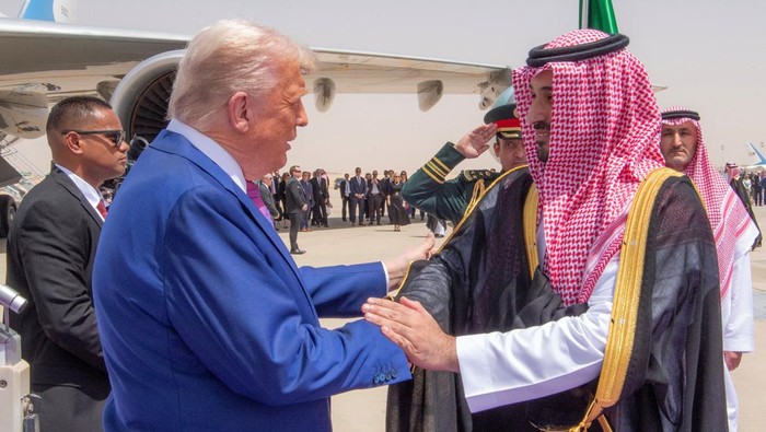 U.S. President Donald Trump shakes hands with Saudi Crown Prince Mohammed Bin Salman during a welcoming ceremony in Riyadh, Saudi Arabia, May 13, 2025. Bandar Algaloud/Courtesy of Saudi Royal Court/Handout via REUTERS    THIS IMAGE HAS BEEN SUPPLIED BY A THIRD PARTY